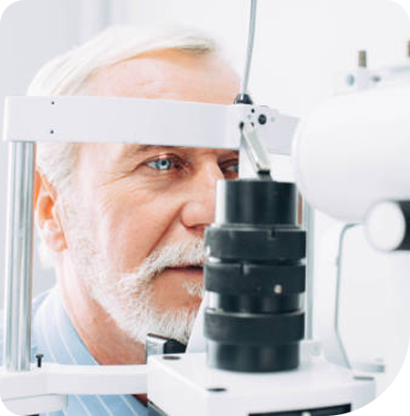 Old man having an eye exam at Kennedy Vision Health Center
