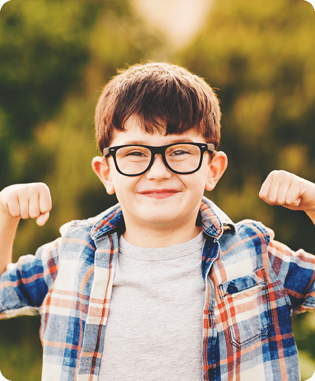Kid smiling wearing glasses