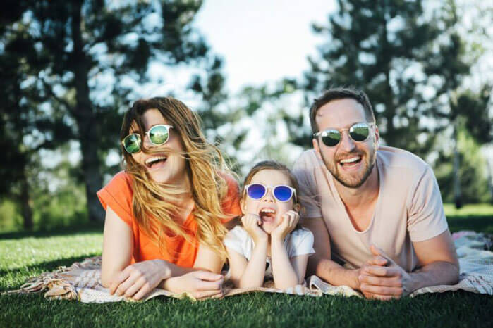 Happy family wearing sunglasses