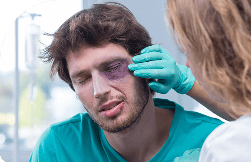 Man getting checked because of black eye