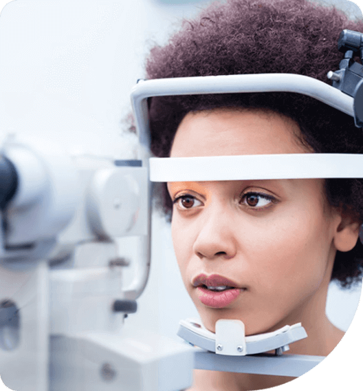 Woman taking comprehensive eye exams
