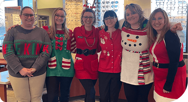 Kennedy Vision Health Center family-wearing christmas costumes